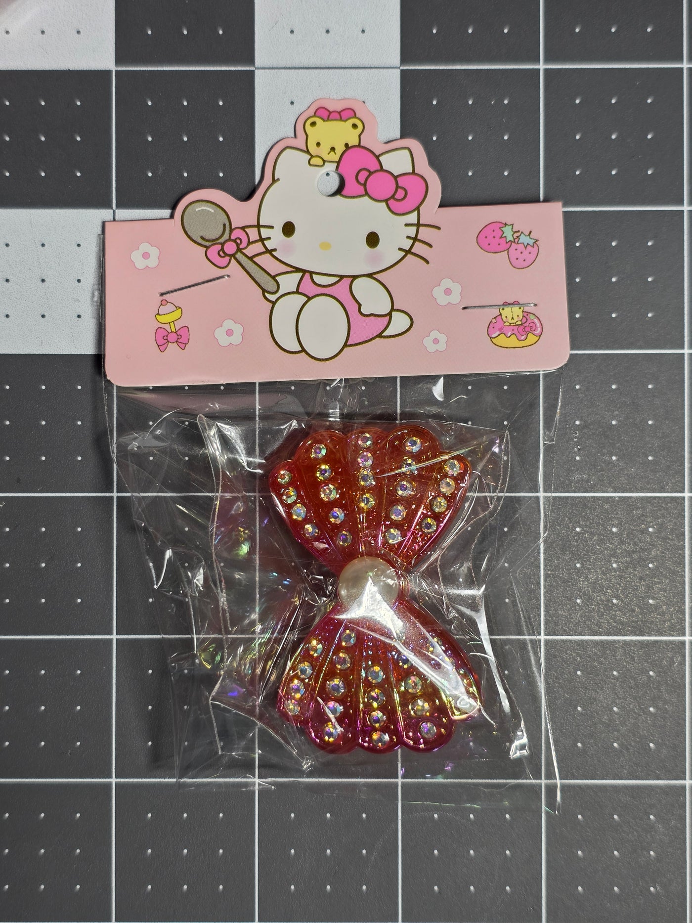 Rhinestone and Pearl Bow Resin Pendant