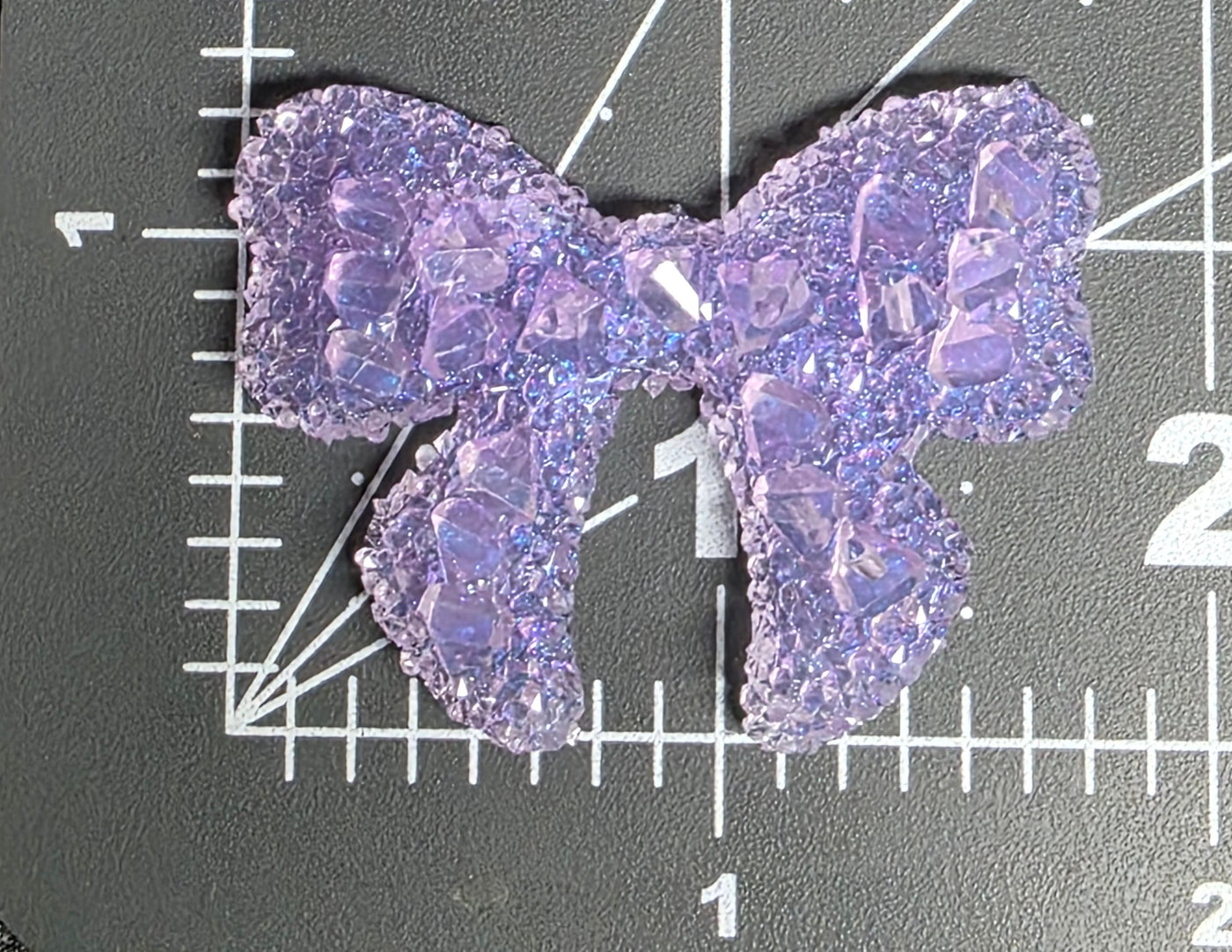 Luminous Sugar Bow Charm