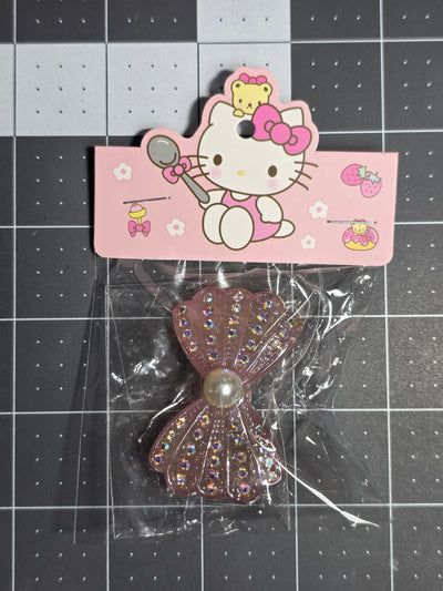 Rhinestone and Pearl Bow Resin Pendant