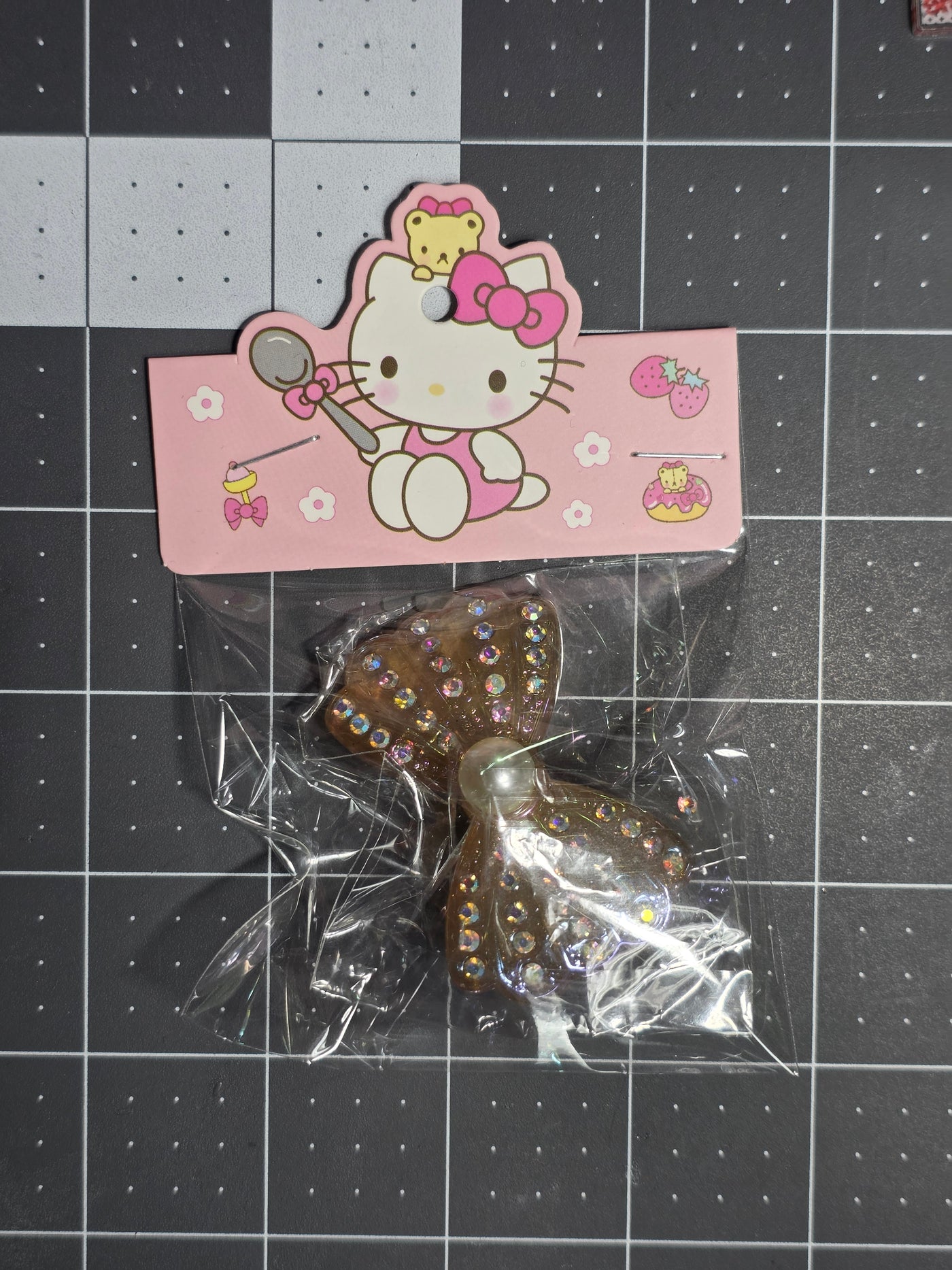 Rhinestone and Pearl Bow Resin Pendant