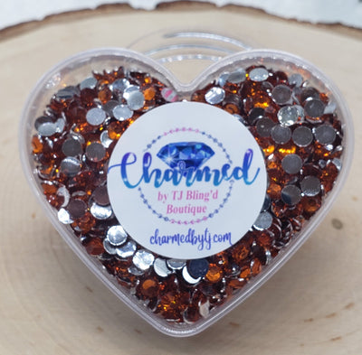 Rhinestones in a Heart Shaped Container